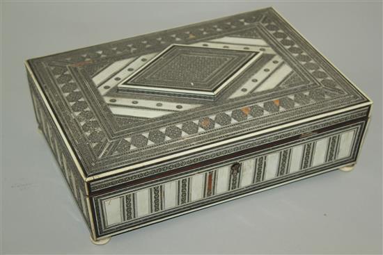 An Indian ivory and sadeli rectangular work box, 11in.